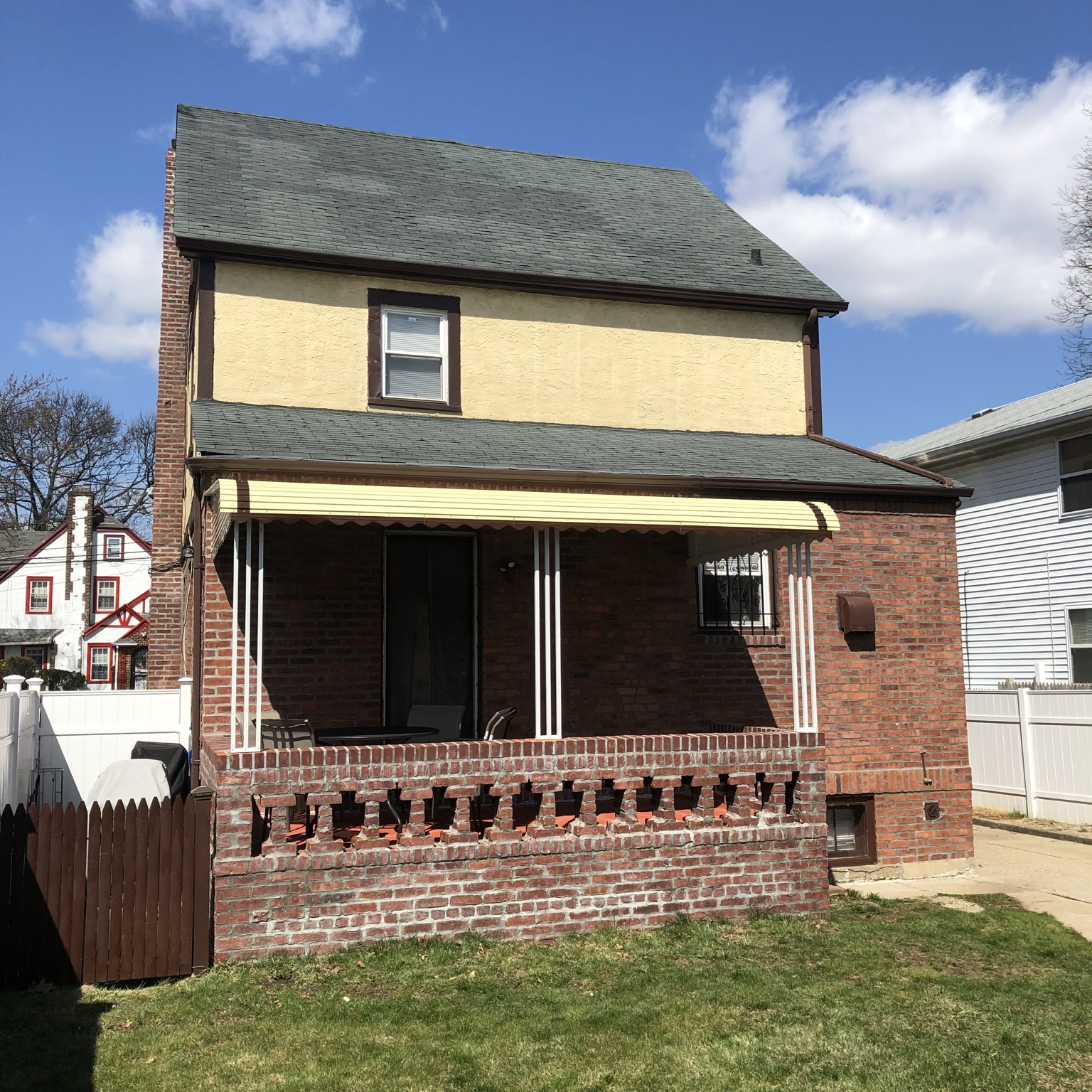 Home with front porch awning