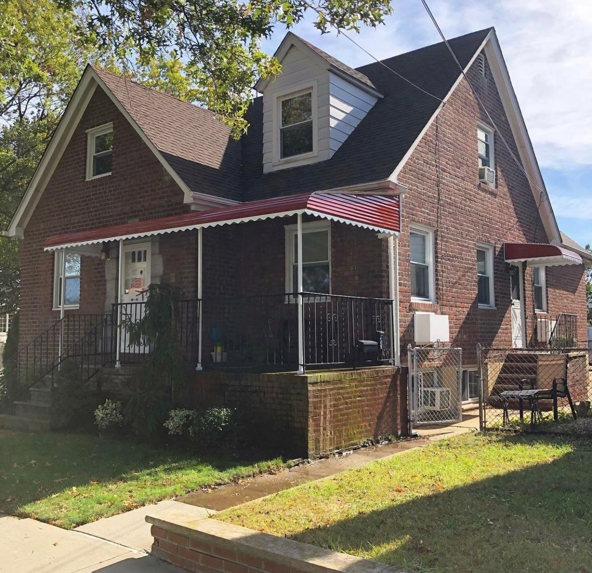 Residential porch with red awning