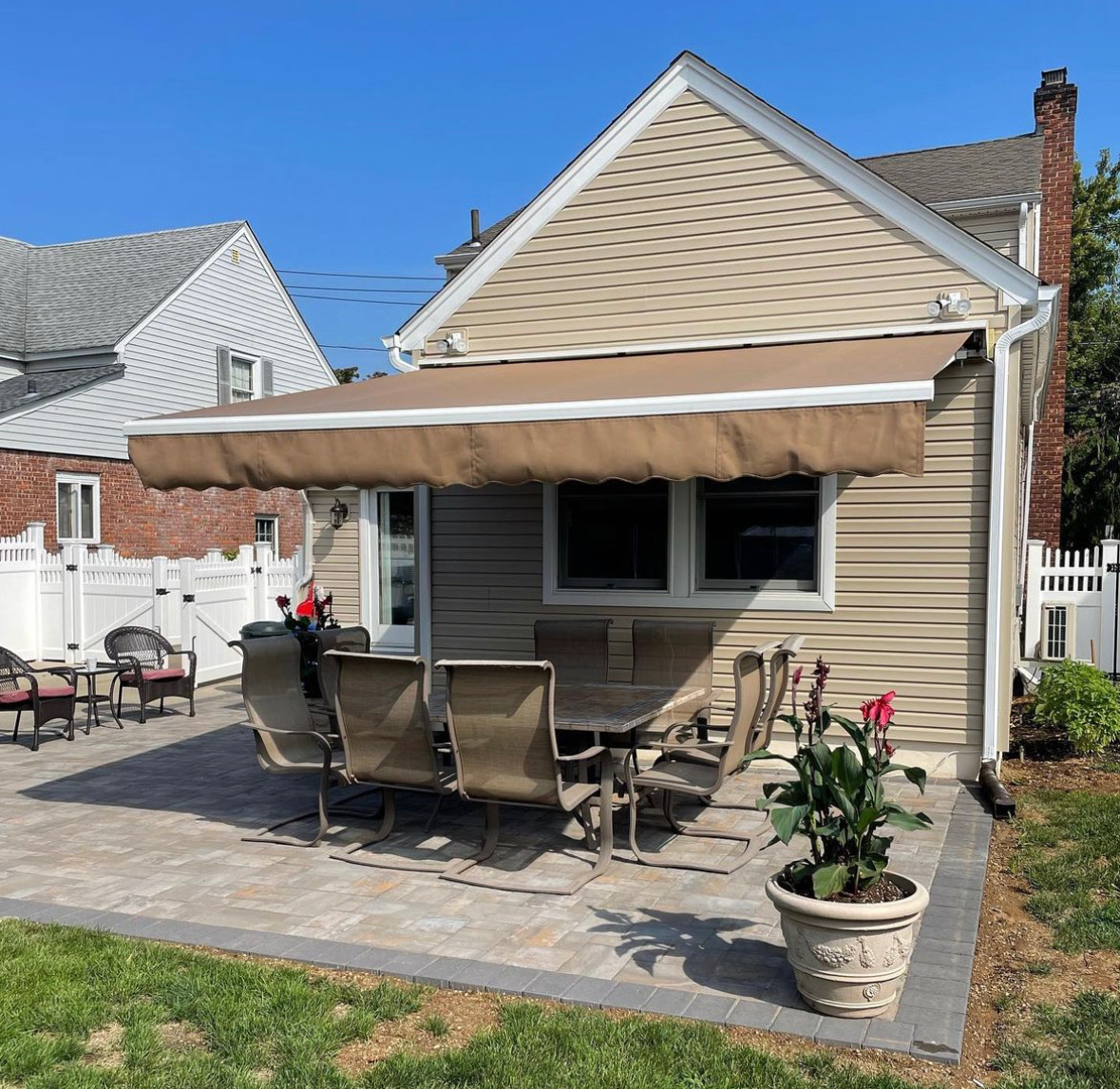 Backyard patio with fabric awning